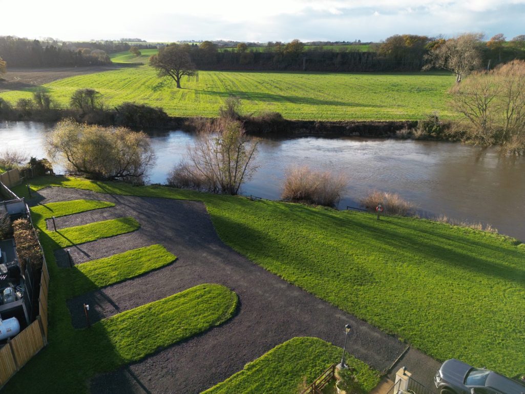 Hardstanding touring pitches beside the River Severn at Danery Meadow Park